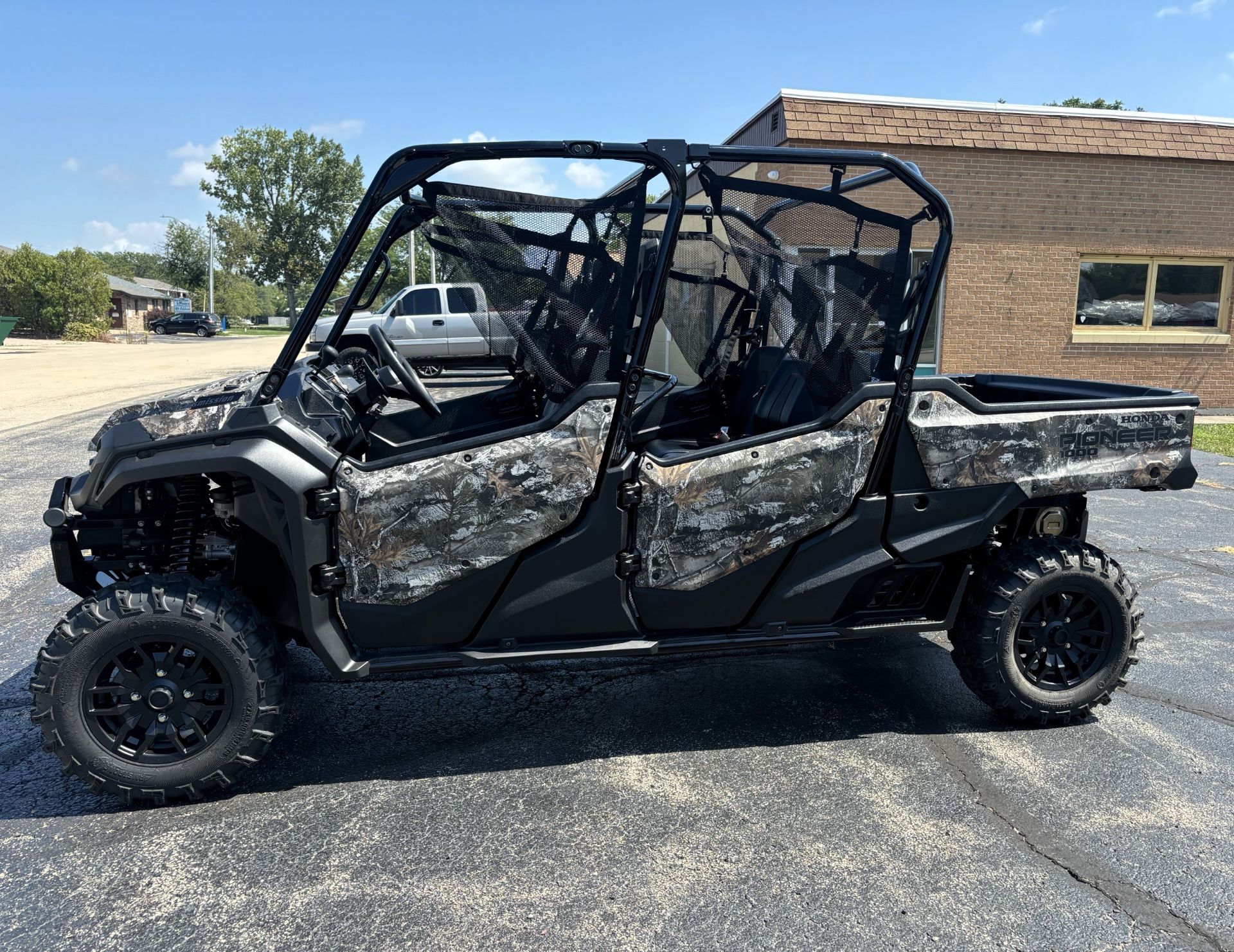 2024 Honda Pioneer 1000-6 Deluxe Crew in Sterling, Illinois - Photo 1