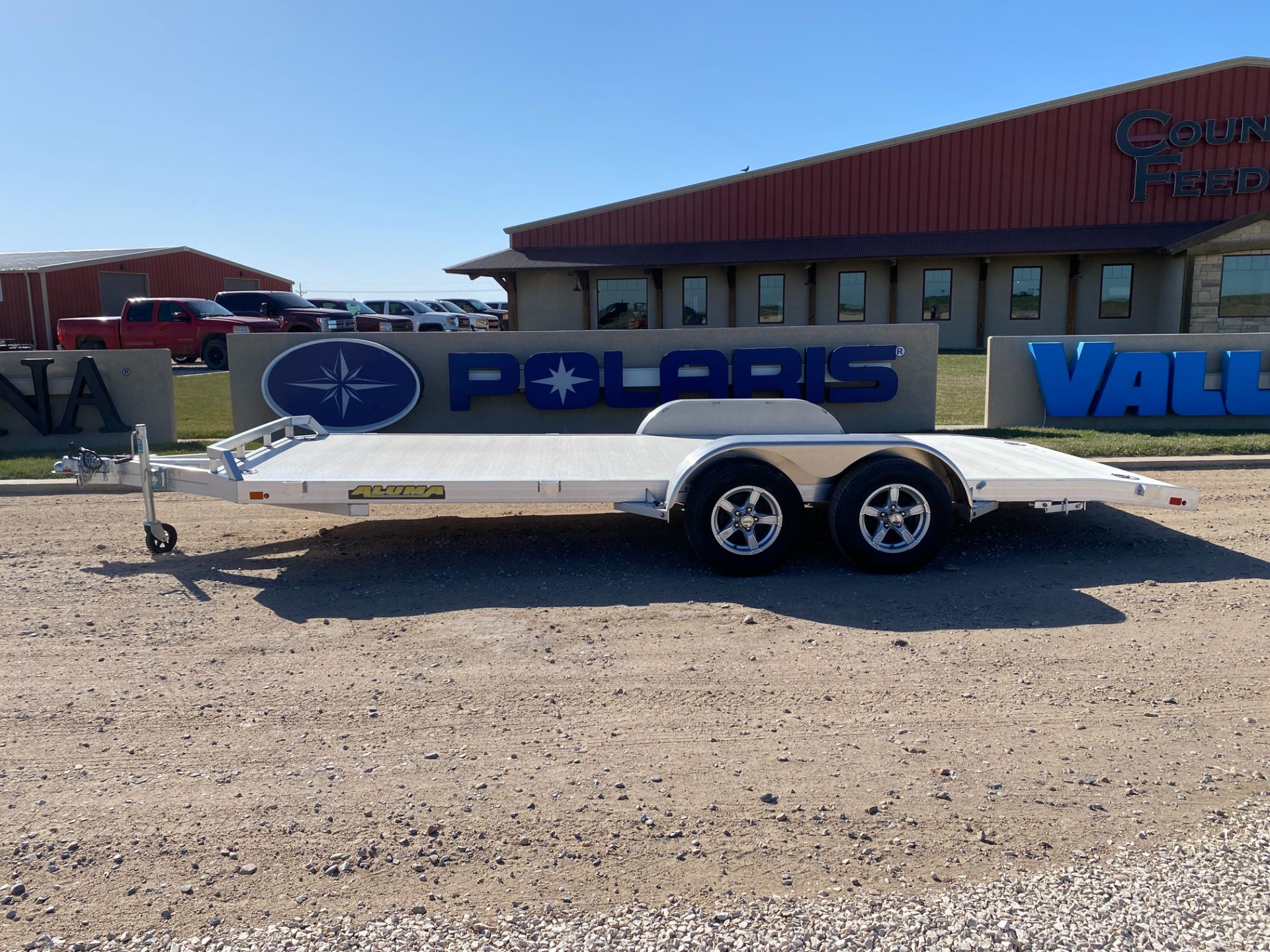 2024 ALUMA 8218 Tandem Axle Electric Brakes Ramp Front Rail Dove  Tail Std 5K RTD 14" Aluminum Wheels in Montezuma, Kansas - Photo 1