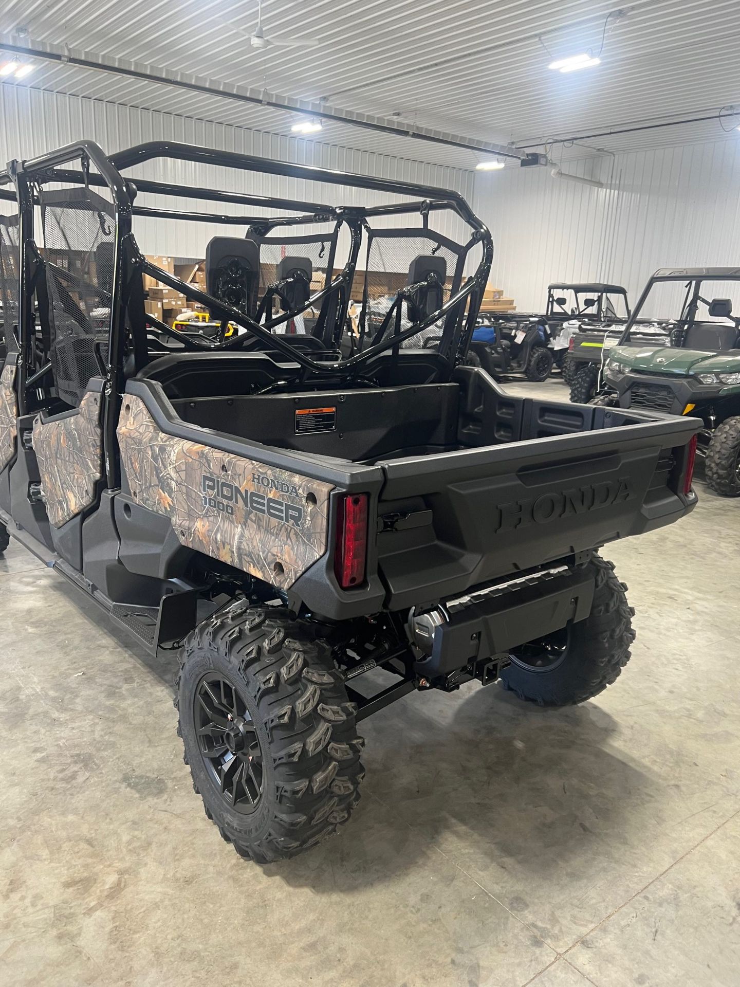 2023 Honda Pioneer 1000-6 Deluxe Crew in Waukon, Iowa - Photo 2