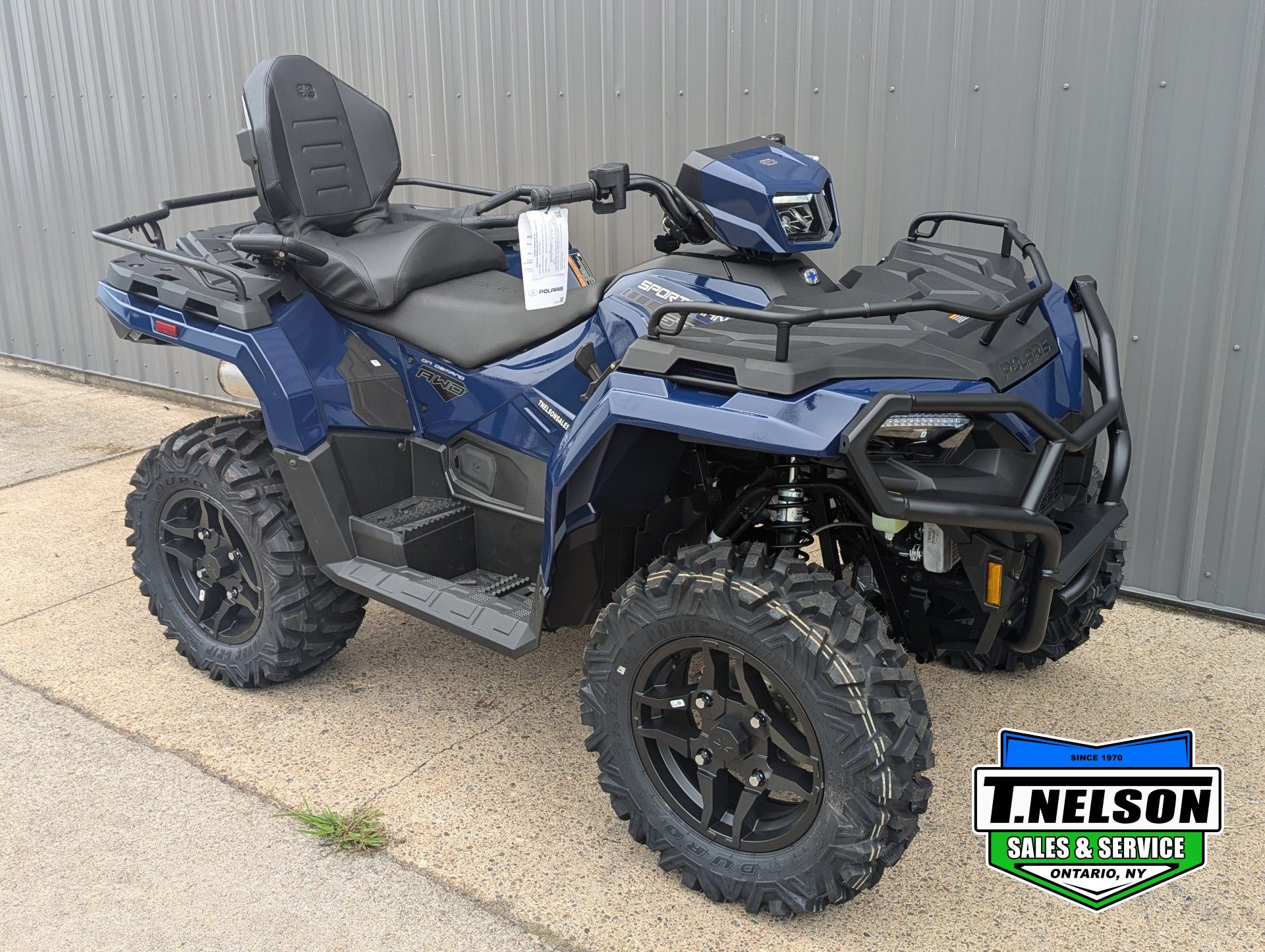 2025 Polaris Sportsman Touring 570 Premium in Ontario, New York - Photo 1