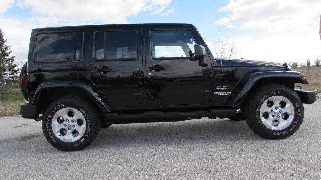 2013 Jeep Wrangler Unlimited Sahara in Big Bend, Wisconsin - Photo 6