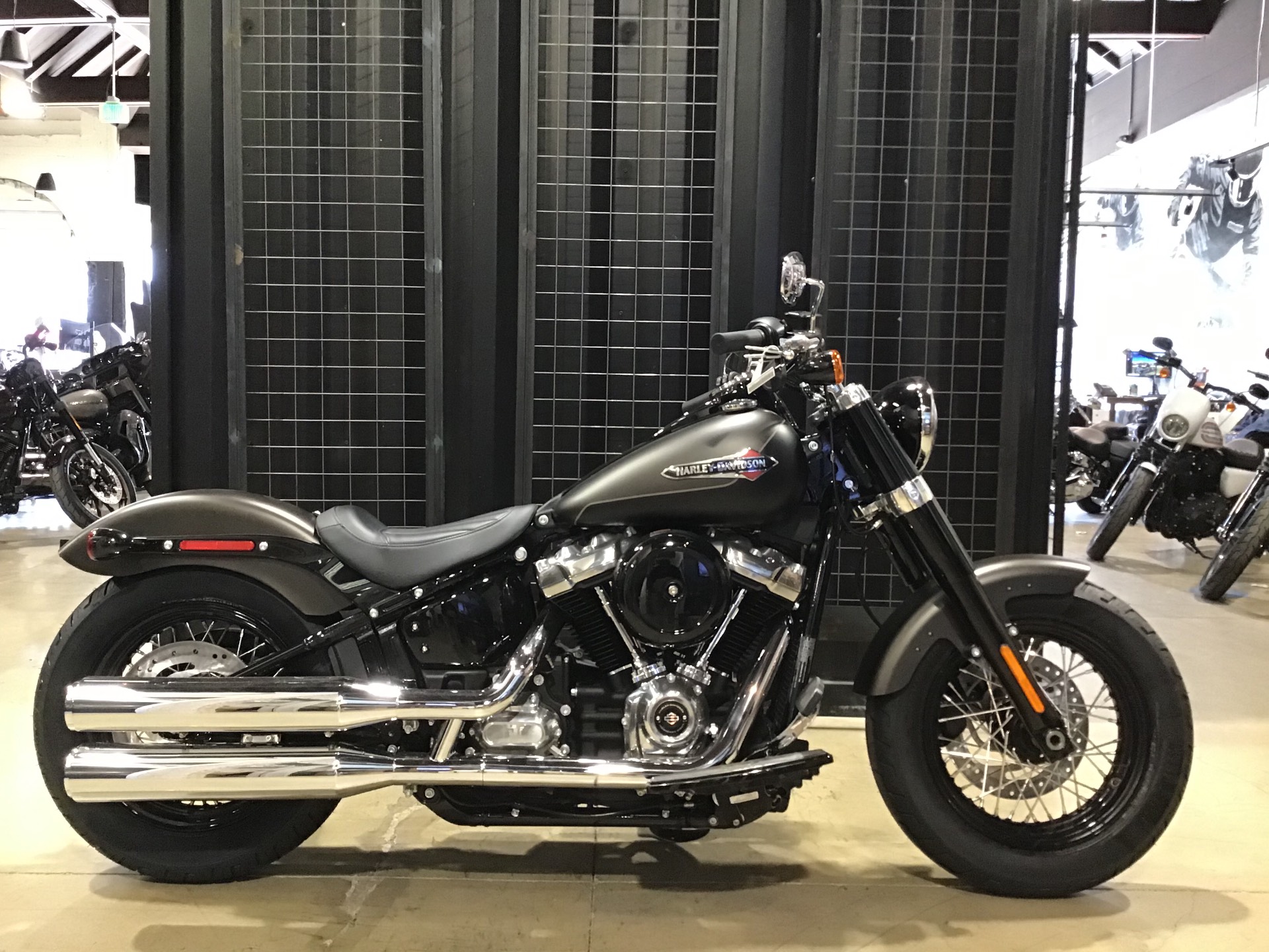 softail slim slip on exhaust