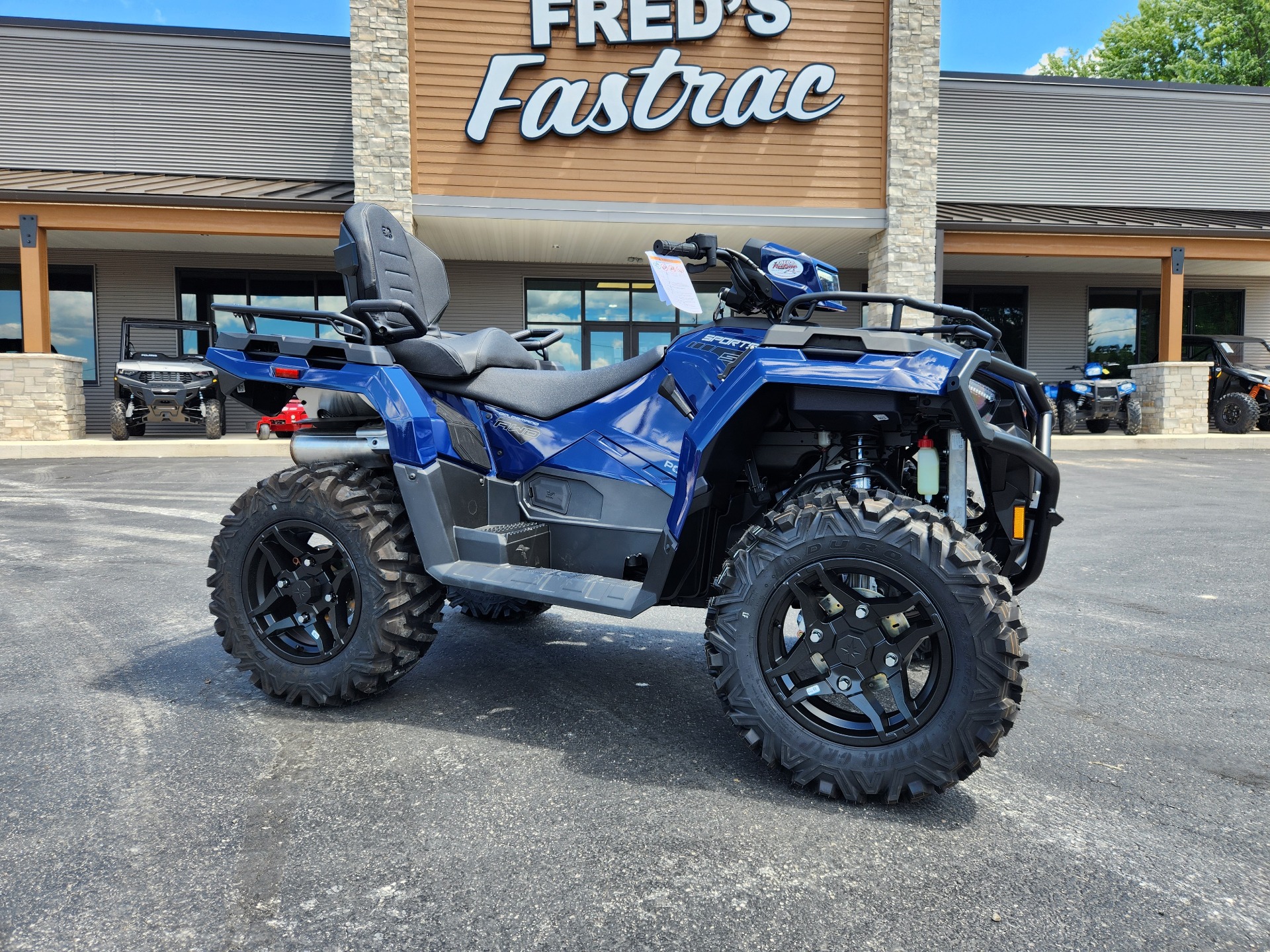 2025 Polaris Sportsman Touring 570 Premium in Fond Du Lac, Wisconsin - Photo 1