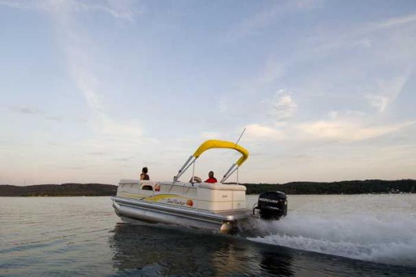 The extended motor pod frees up deck space and helps the boat handle easier. - Photo 23