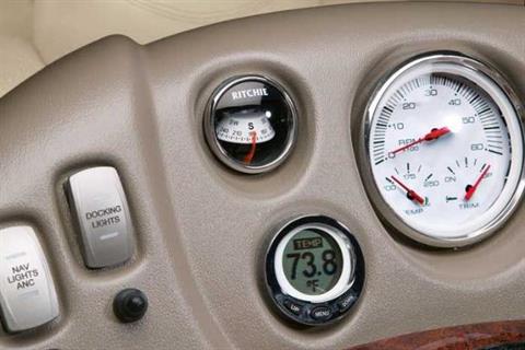 The console features full instrumentation, soft-touch switches and a flush-mounted compass. - Photo 8