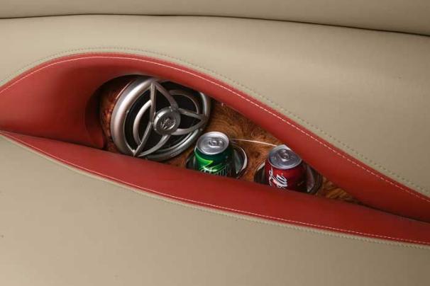 Recessed speakers and drink holders let you keep your drinks close by, yet out of the way. - Photo 18